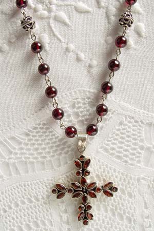 Garnet w 2 in faceted garnet cross